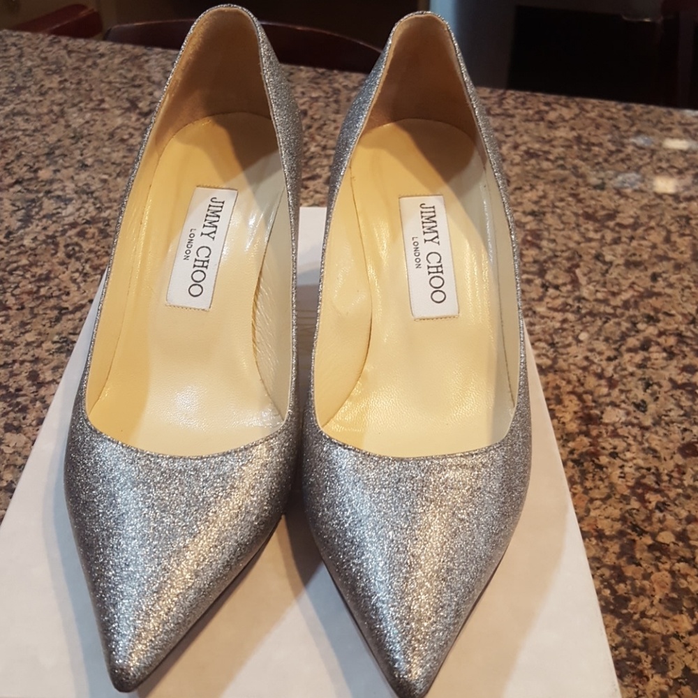 Jimmy Choo silver pumps.